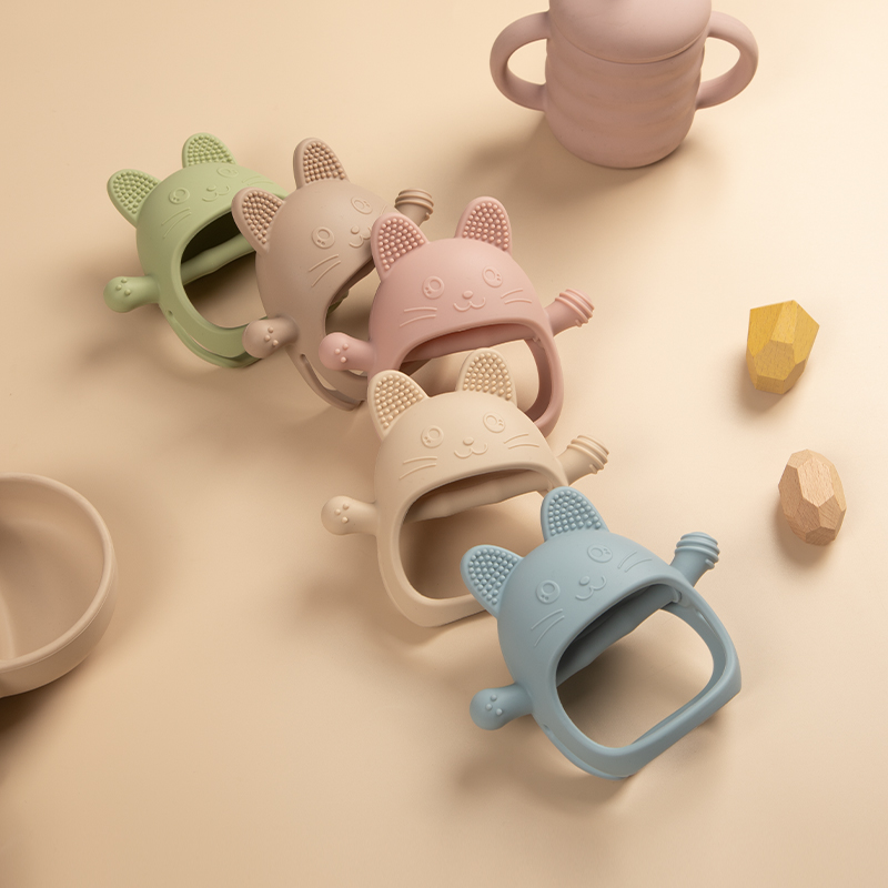 Gryzak dla niemowląt, silikono – Teething Mitten Baby recenzja i cena